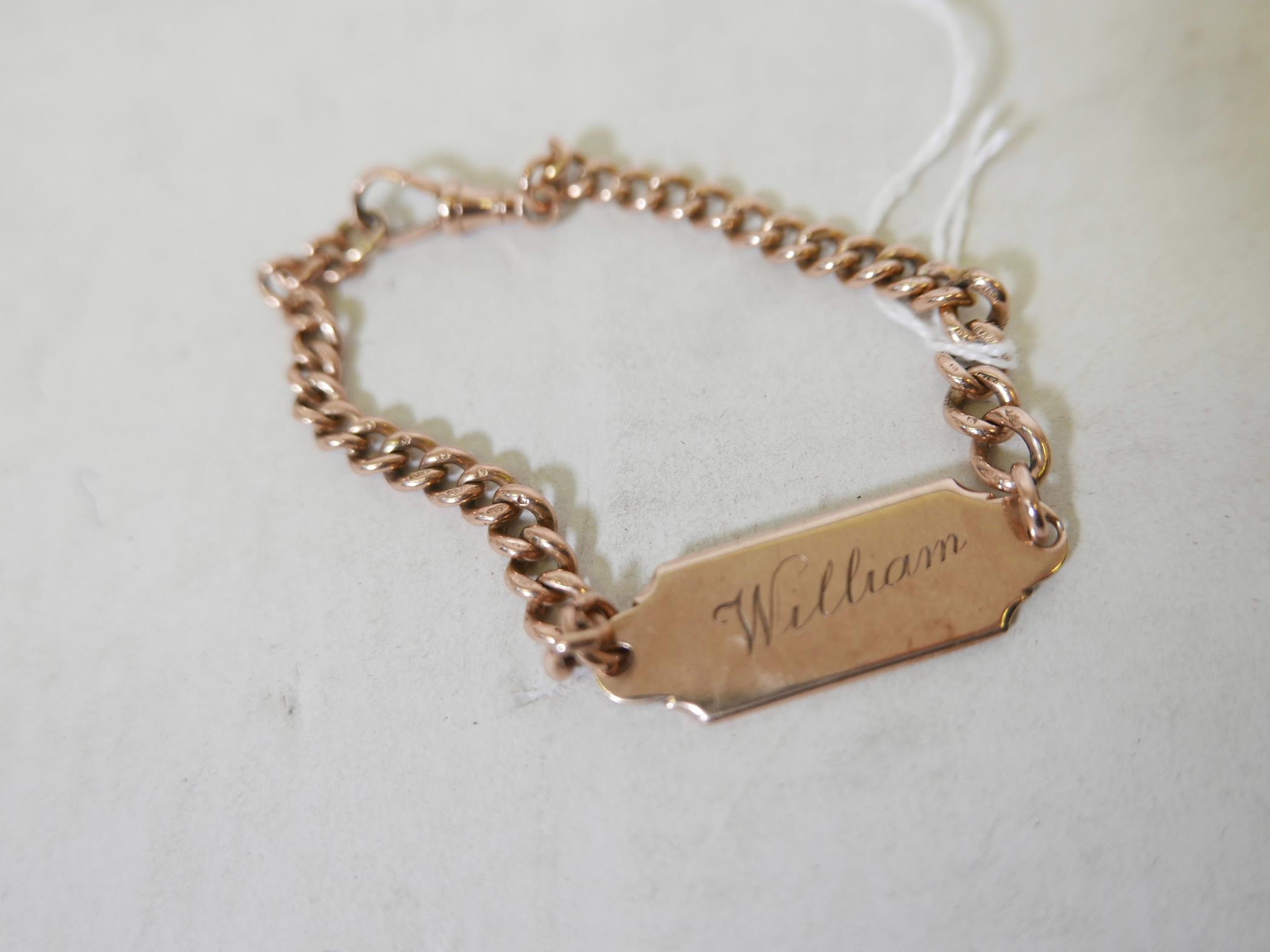 A 9ct gold identity bracelet, engraved 'William' with date of birth, 17.7g