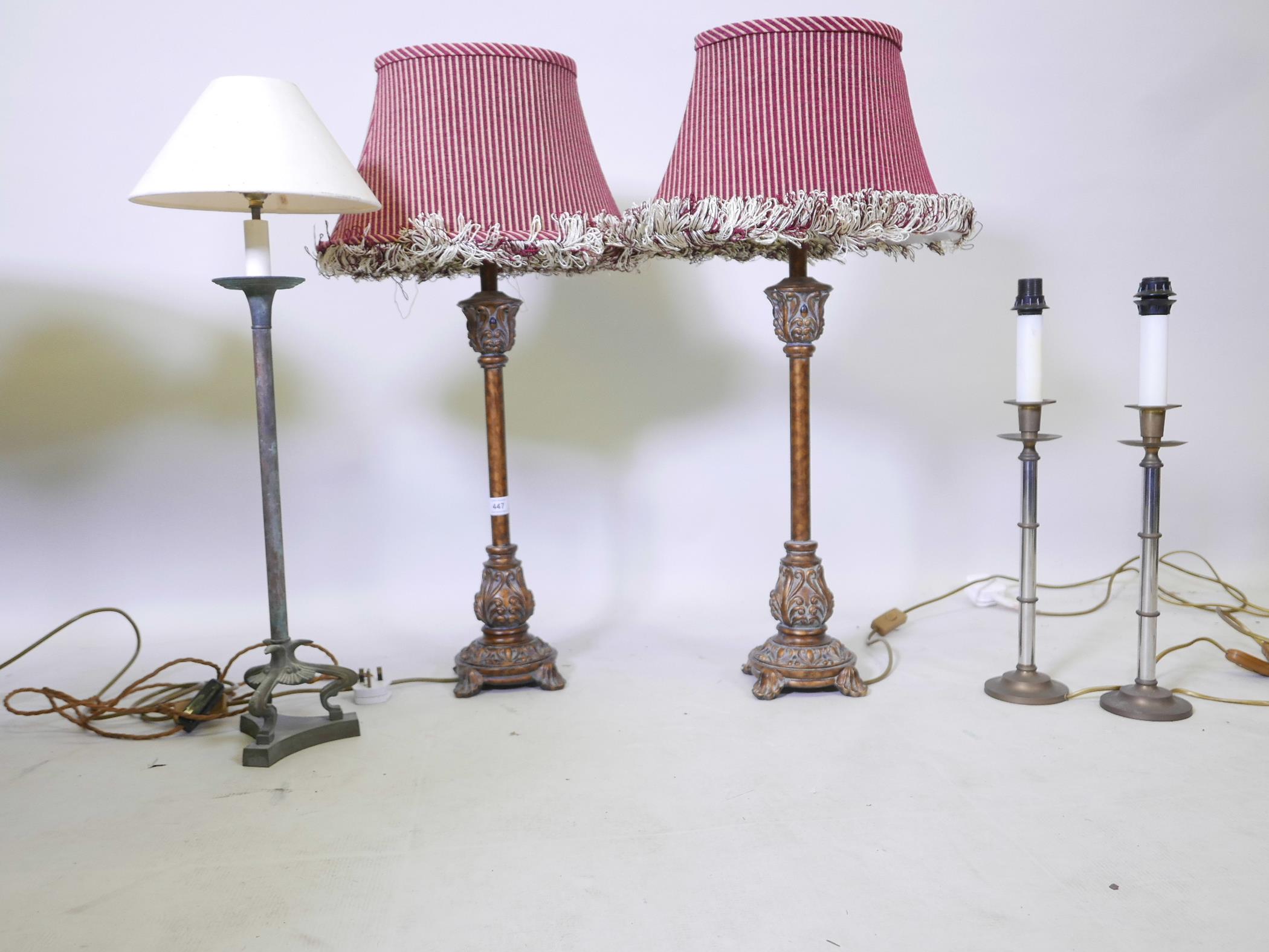 A pair of gilt composition table lamps, 31" with shades, a pair of chrome and brass lamps and bronze