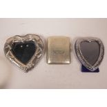 A hallmarked silver cigarette case, 81.4g, together with a hallmarked silver heart shaped photograph