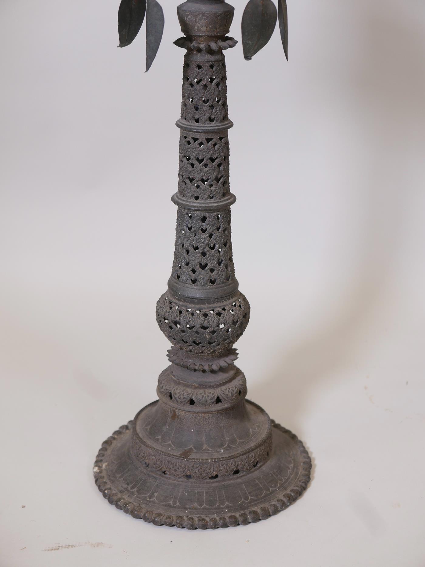 An Indian bronze standing lamp or stoop with pierced decoration to the column, 35" high x 10" - Image 3 of 4