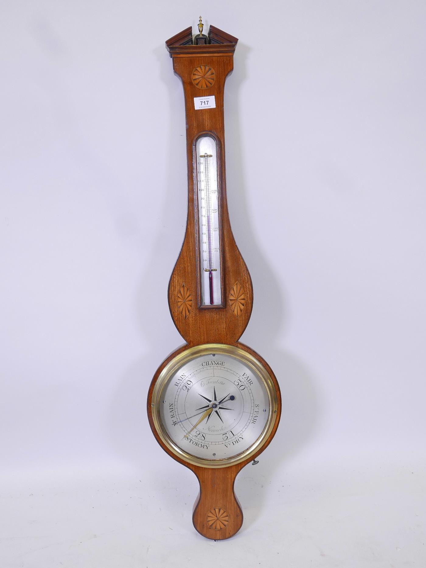 An early C19th inlaid mahogany banjo barometer, the silvered dial engraved C. Trombetta, Norwich,