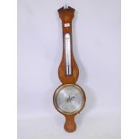 An early C19th inlaid mahogany banjo barometer, the silvered dial engraved C. Trombetta, Norwich,
