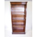 A mahogany open front bookcase with adjustable shelves, 33" x 13" x 73"
