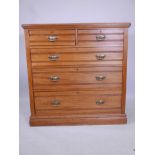 A Victorian satinwood chest of two short and three long drawers, 42" x 21" x 42½" high