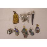 A quantity of Tibetan white metal and stone set pendants and earrings, largest 3½"