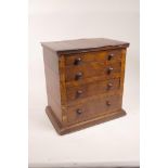An apprentice's walnut chest of four graduated drawers, 11½" x 8" x 12" high