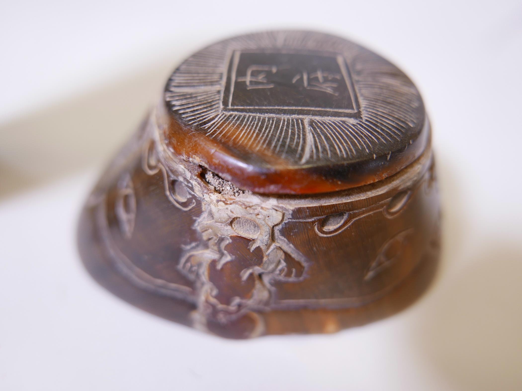 A Chinese hoof and horn paper weight carved with symbols and calligraphy, 4" long, together with - Image 2 of 5