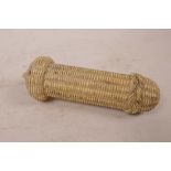 A carved bone needle case with screw top and basket weave decoration, 4½" long