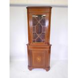 An inlaid mahogany corner cabinet with astral glazed door, 19" x 19" x 74" high