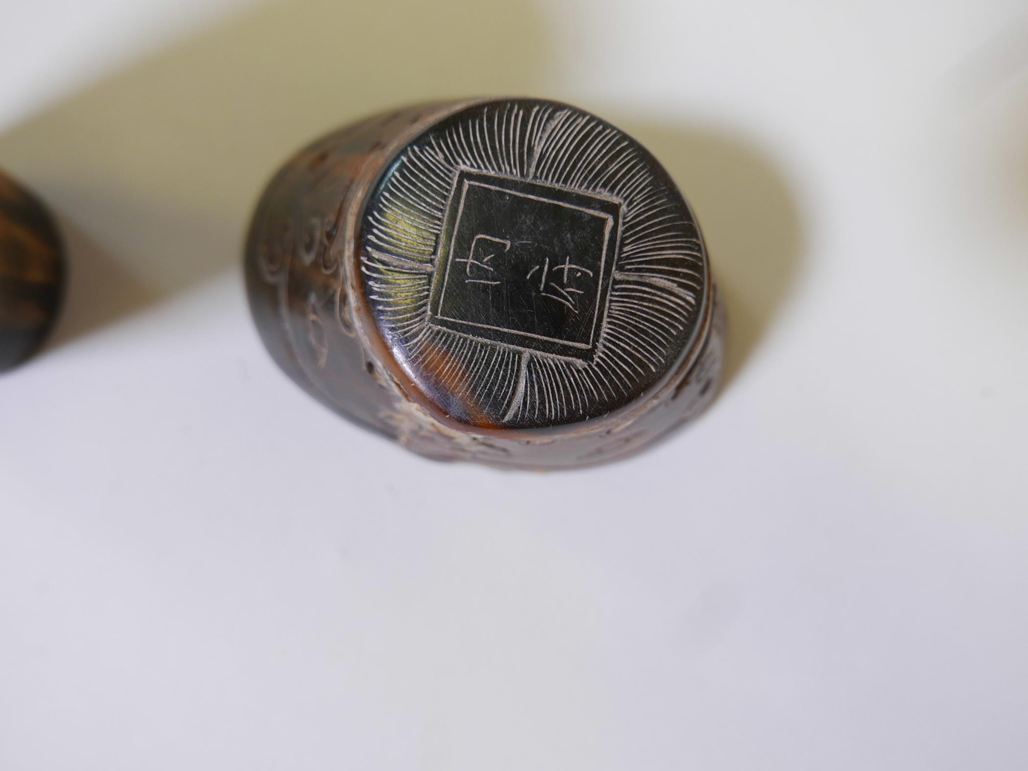 A Chinese hoof and horn paper weight carved with symbols and calligraphy, 4" long, together with - Image 5 of 5