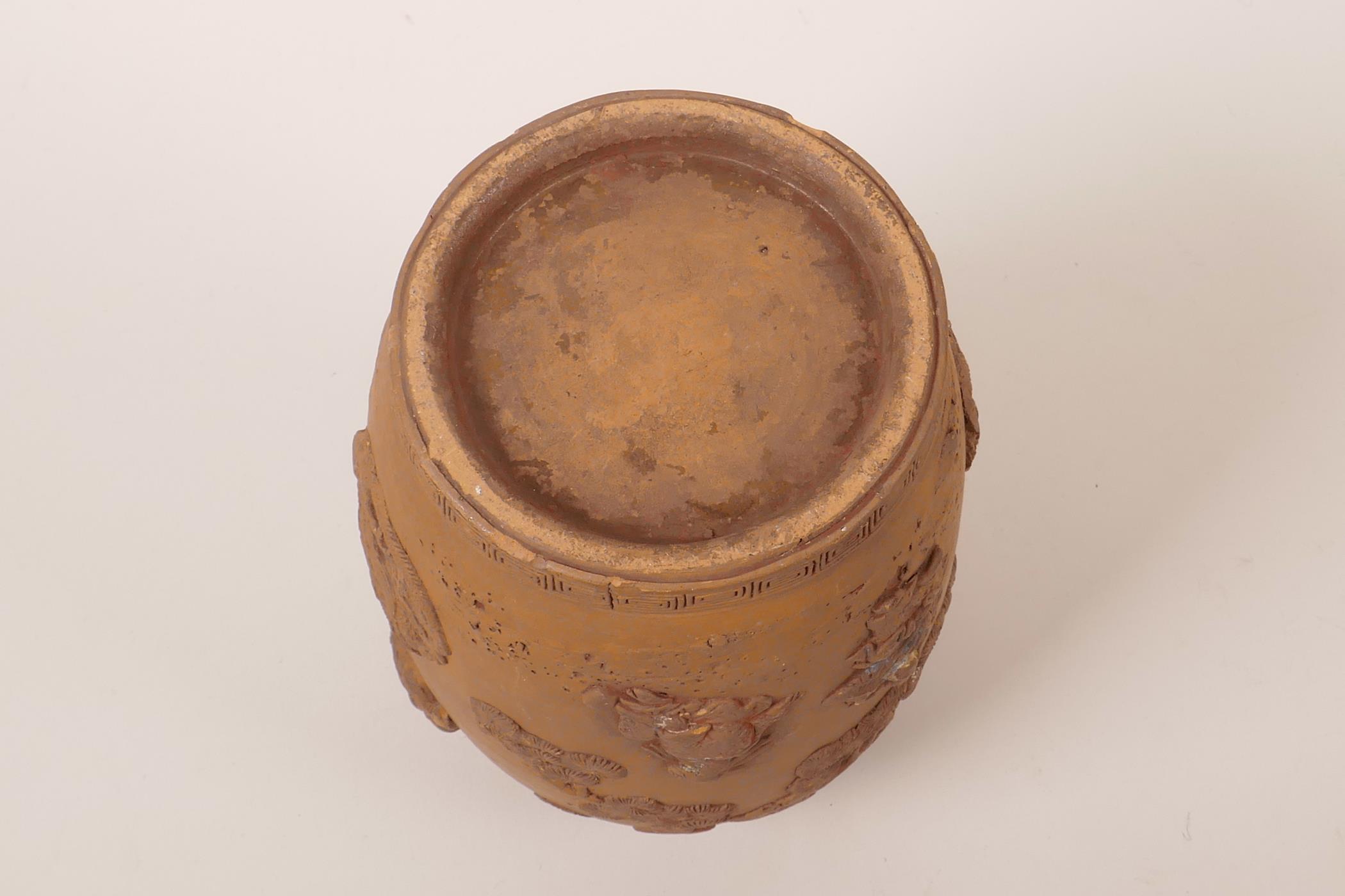 A Chinese earthenware jar with raised decoration of a figure and dragon, A/F losses and chips, 7" - Image 7 of 7