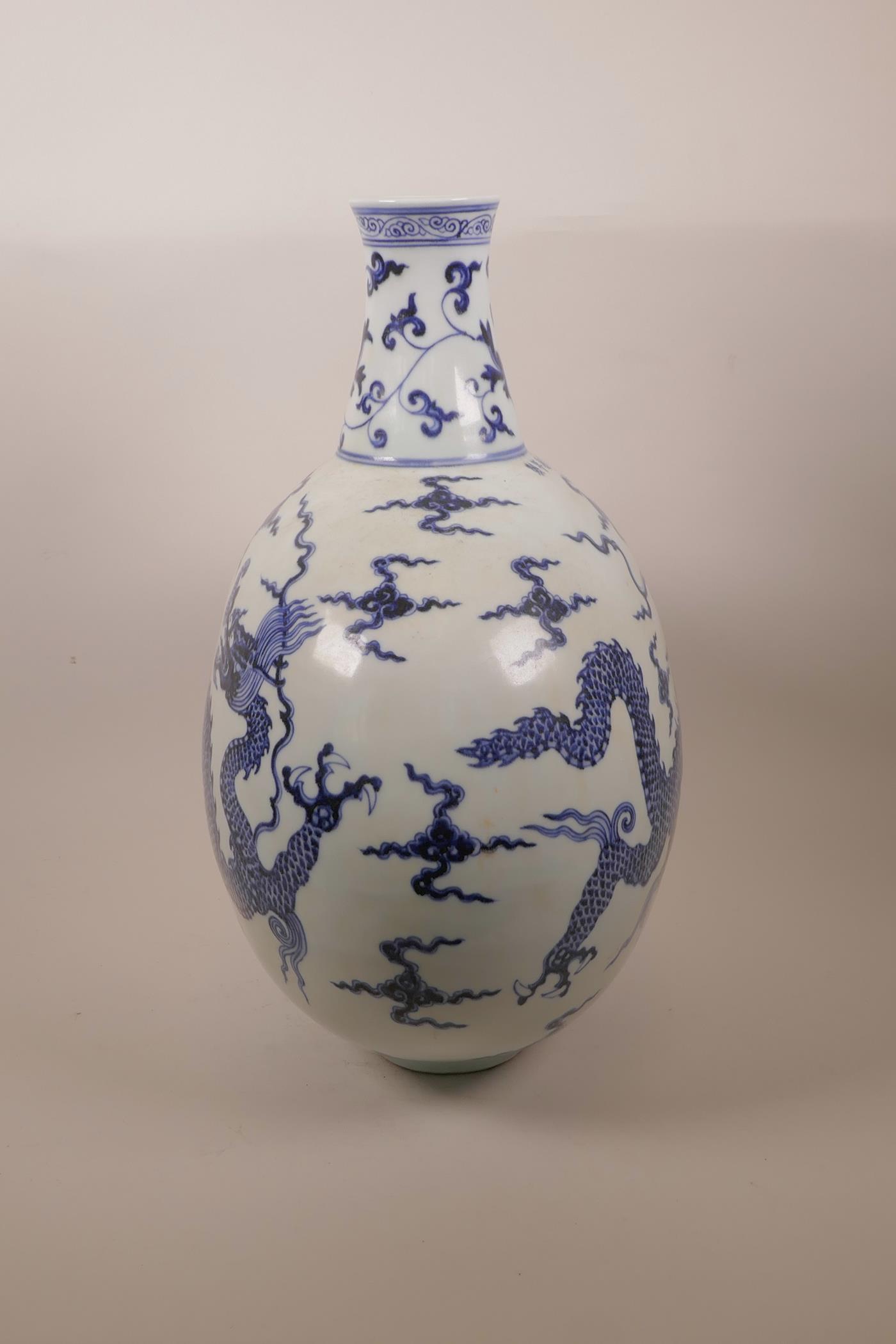 A Chinese blue and white porcelain moon flask decorated with a dragon in flight, six character - Image 2 of 6