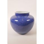 A Chinese mottled blue glaze pottery jar, 7½" high, 9" diameter