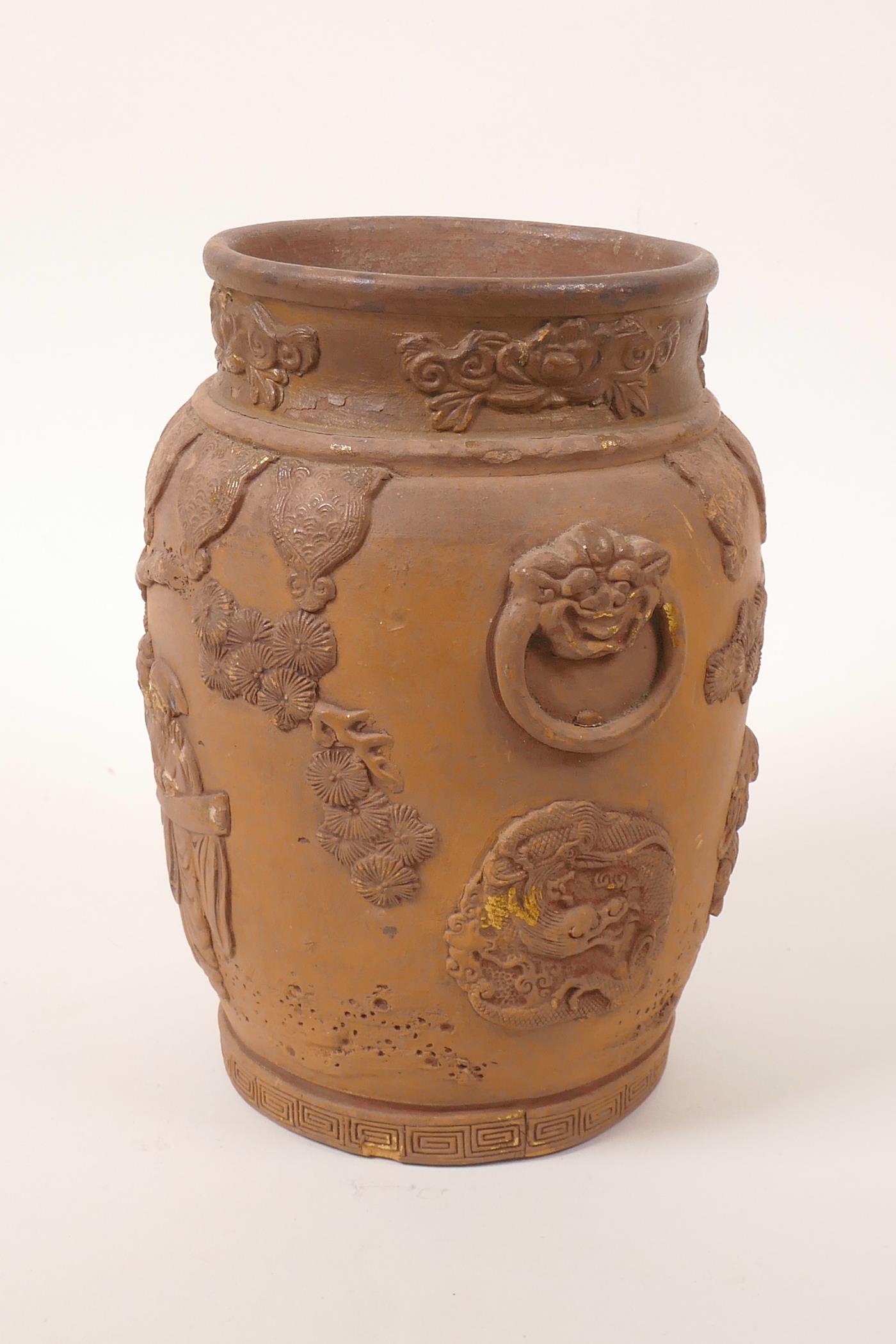 A Chinese earthenware jar with raised decoration of a figure and dragon, A/F losses and chips, 7" - Image 3 of 7