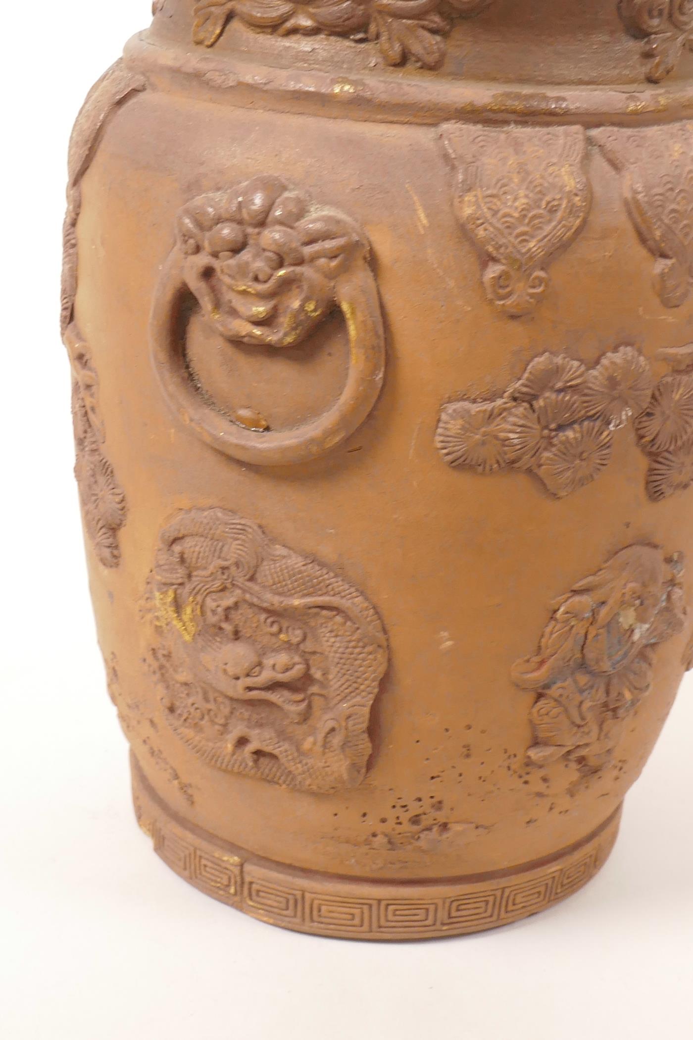 A Chinese earthenware jar with raised decoration of a figure and dragon, A/F losses and chips, 7" - Image 6 of 7