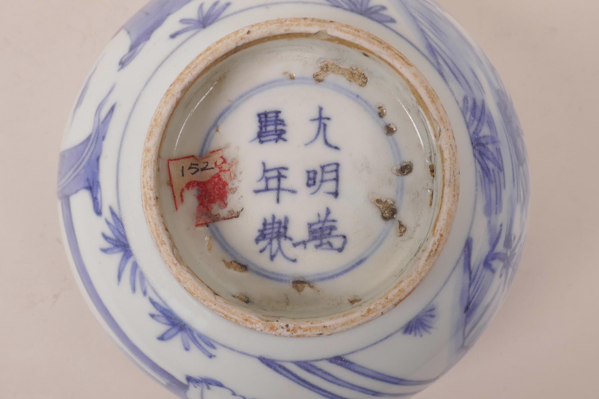 A Chinese blue and white porcelain rice bowl decorated with figures in a garden, six character - Image 6 of 6