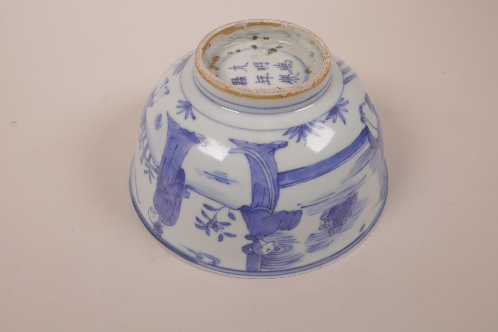 A Chinese blue and white porcelain rice bowl decorated with figures in a garden, six character - Image 3 of 6