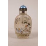 A Chinese reverse decorated glass snuff bottle depicting a musician and student, character