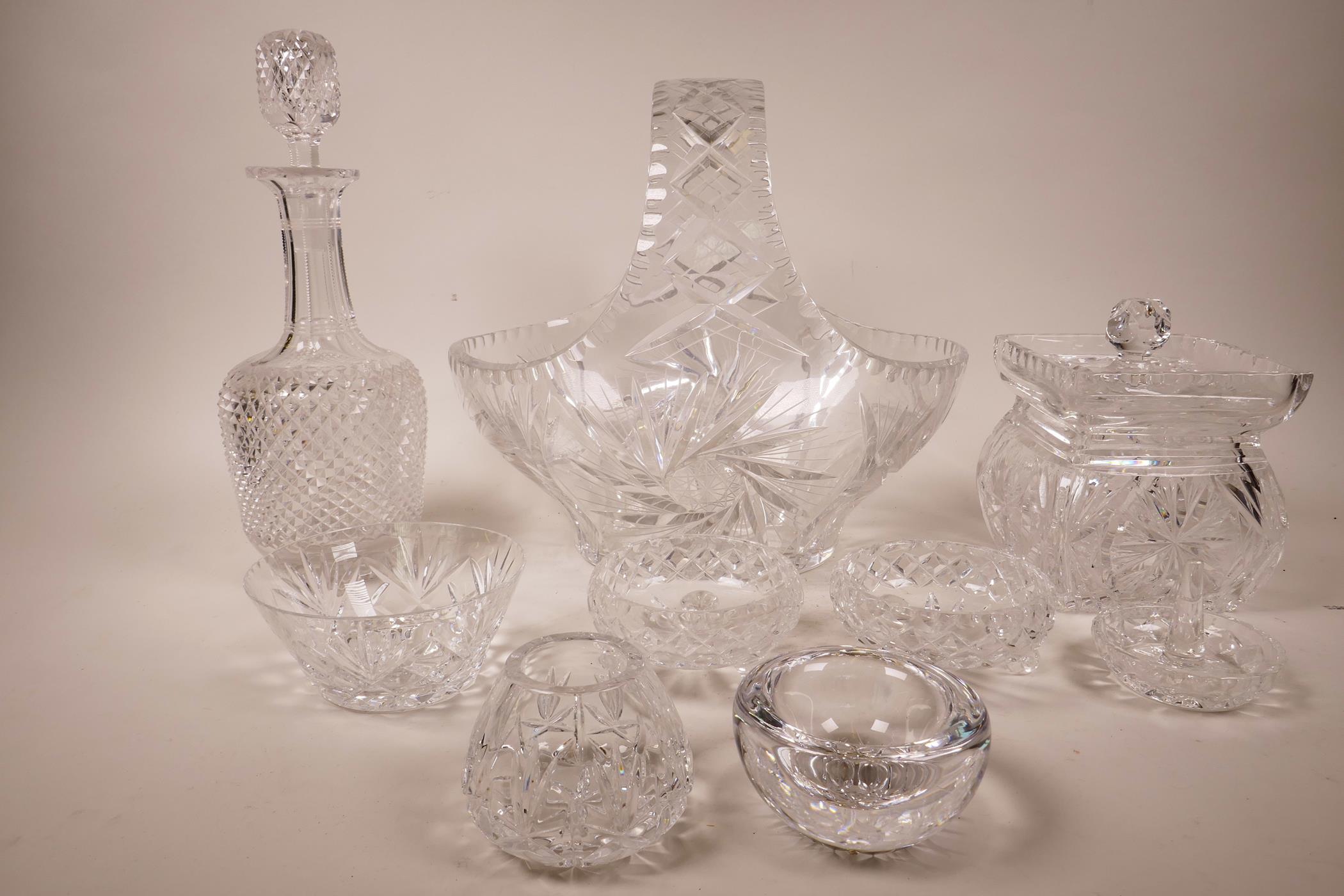 A lead crystal cut glass basket with traditional starburst design, 12" high x 12" long; an Edinburgh