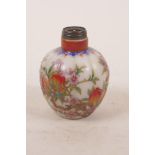 A Chinese enamelled glass snuff bottle in the form of a gourd, decorated with a fruiting peach tree,