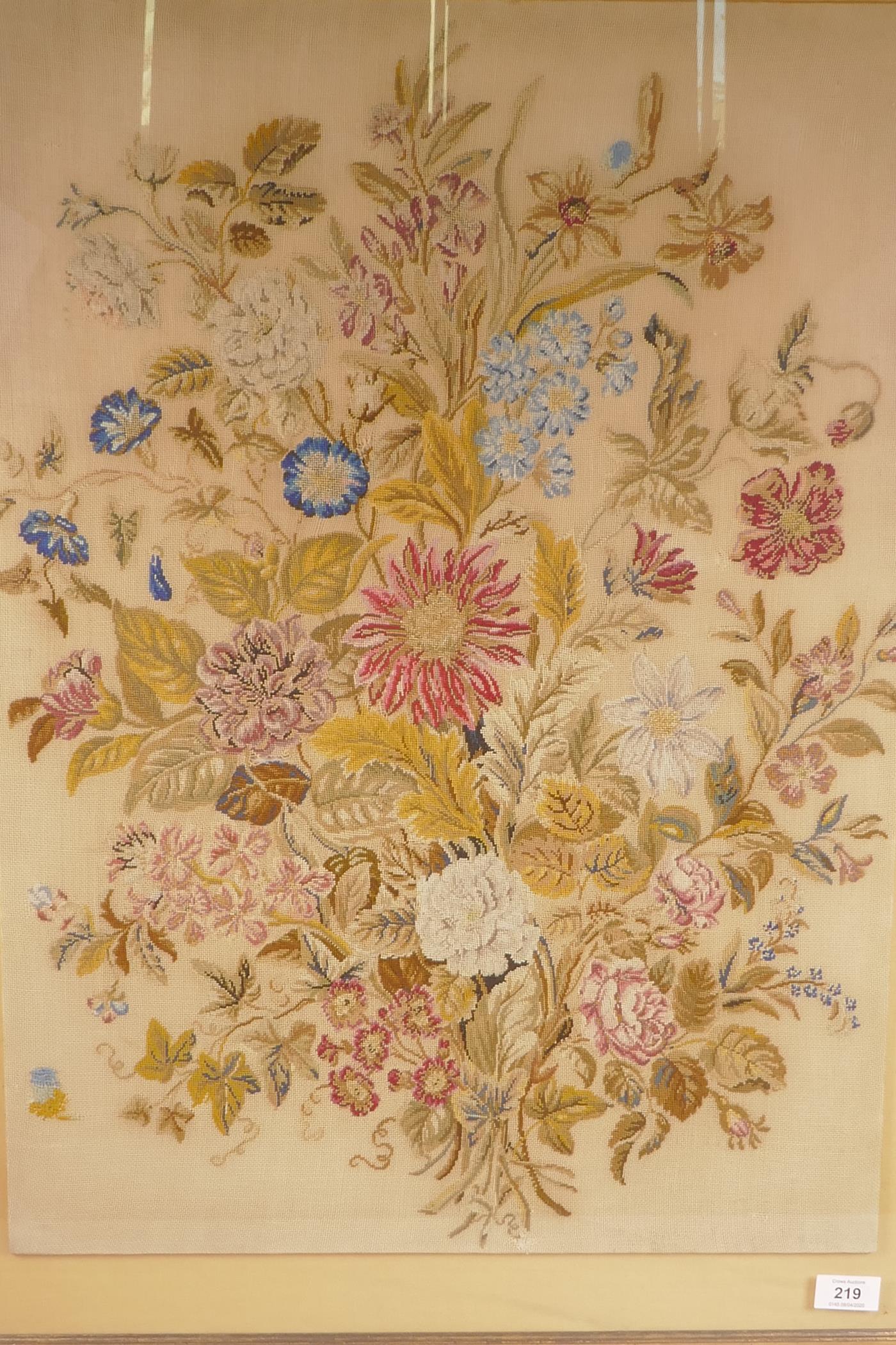 An early C20th tapestry, a bouquet of summer flowers, in a gilt frame, 20" x 28"