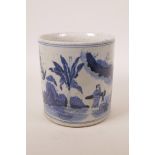 A Chinese blue and white pottery brush pot decorated with figures in an ornamental garden, 7" high x