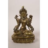 A Chinese gilt bronze Buddha seated on a lotus throne, impressed double vajra mark to base, 8"high