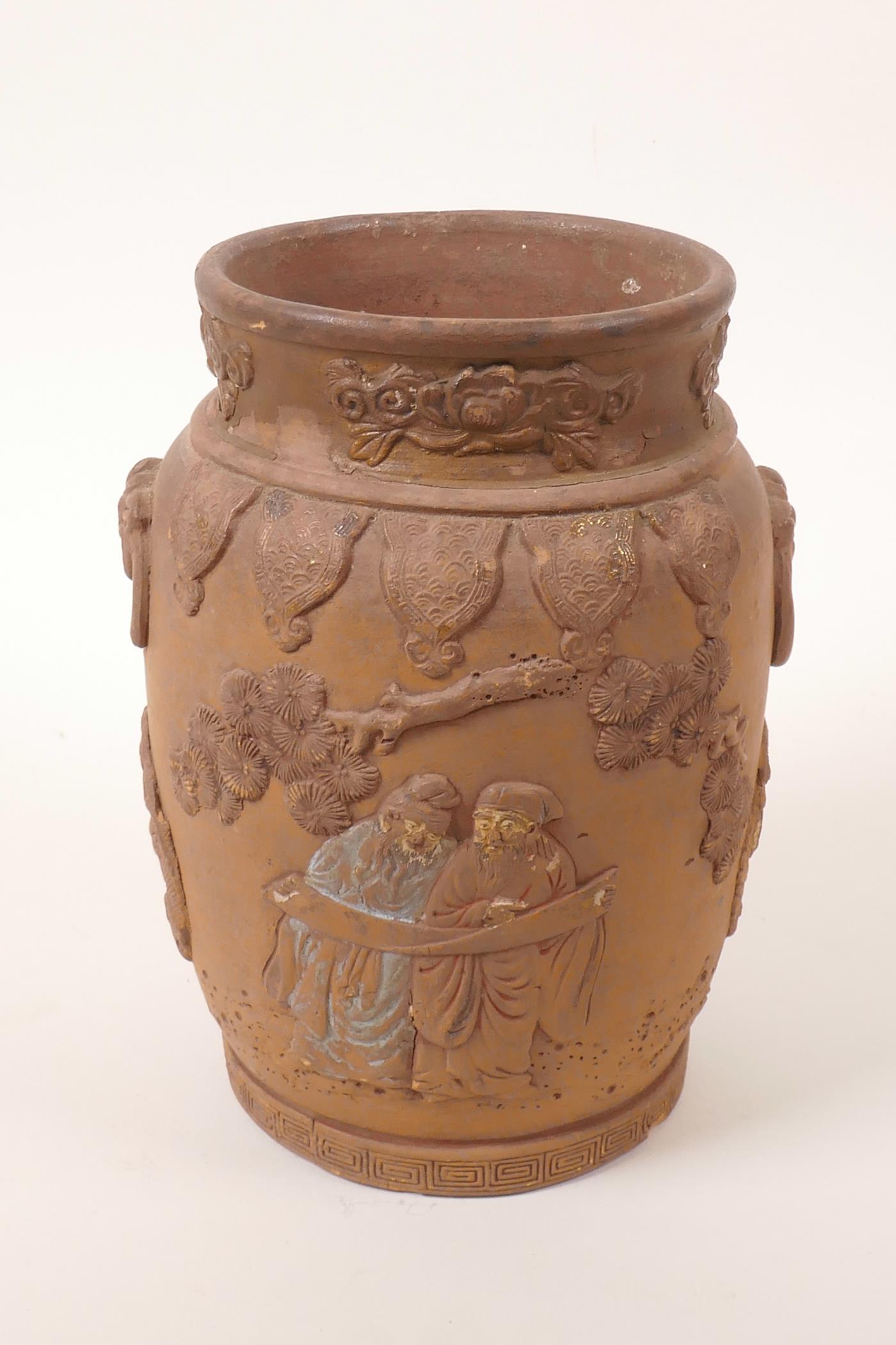 A Chinese earthenware jar with raised decoration of a figure and dragon, A/F losses and chips, 7" - Image 2 of 7