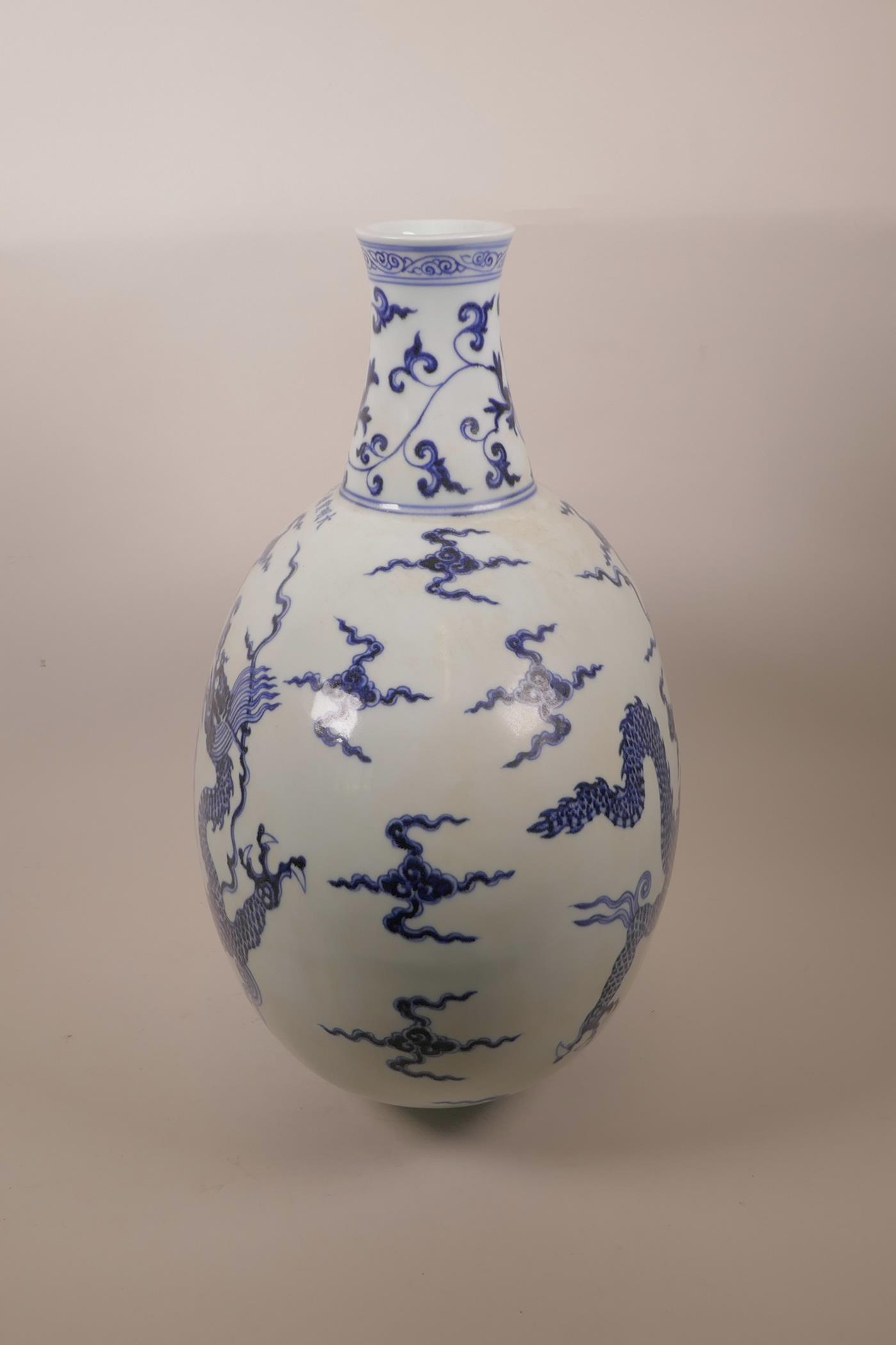 A Chinese blue and white porcelain moon flask decorated with a dragon in flight, six character - Image 4 of 6