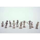 A collection of ten African brass miniature figures, 2" high