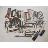 A quantity of vintage hand tools, various wrenches, adjustable spanners, a Porsche diesel spanner,