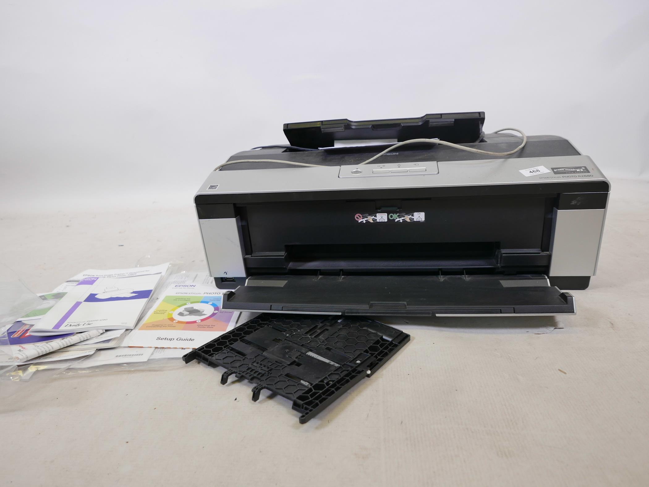 An Epsom Stylus Photo R2880 printer with manuals