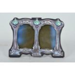 A sterling silver Art Nouveau style two section easel back frame with enamelled details, 3" x 4½"