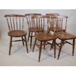 Two stick back penny seat kitchen chairs together with three similar stick back kitchen chairs