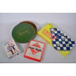 A vintage Harrod's collar box together with three vintage games, 'Chess', 'Monopoly' and 'His and