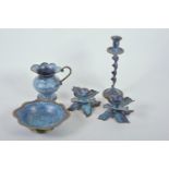 A pair of verdigris brass dwarf candlesticks on petal shaped bases, 3" high, together with a similar