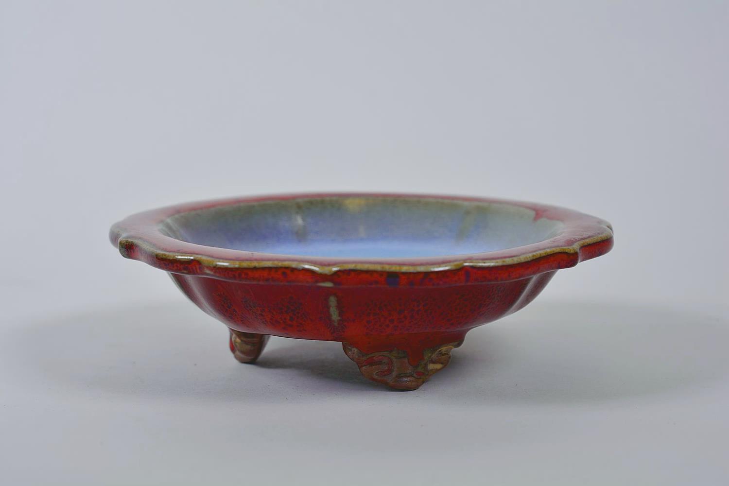 A Chinese Jun ware dish on tripod feet with a lobed rim and flambé glaze, mark to base, 6½" diameter - Image 5 of 7
