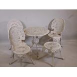 A white painted metal garden table and three matching chairs with a stool, table 27" diameter