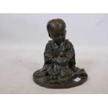 A good bronze figure of a Japanese child holding a doll, unsigned, probable late C19th/early