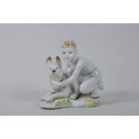 A Russian LFZ Lomonosov Imperial Porcelain Factory (St Petersburg) porcelain figure of 'a Soviet boy