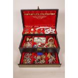 A cantilever jewellery box and a quantity of costume jewellery, 12½" x 8" x 5"