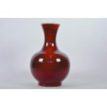 A Chinese flambé glazed pottery vase, 6 character mark to base, 13" high