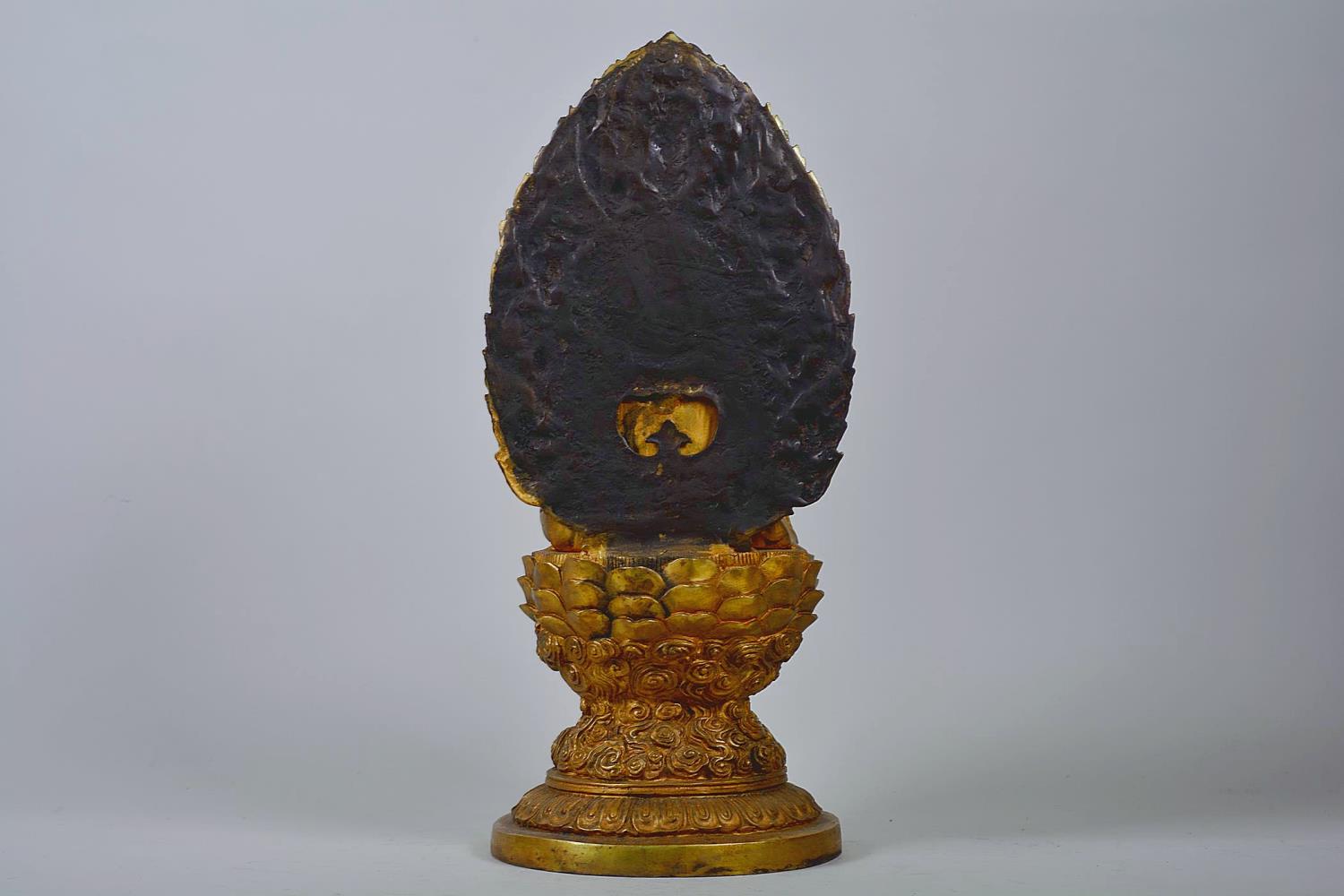 A large Chinese gilt metal Buddha seated on a lotus throne, impressed 4 character mark to base, - Image 3 of 7