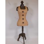 A vintage tailor's dummy with waisted hessian body on turned support and tripod base, 59" high