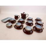 A Denby Homestead brown and blue coffee service comprising coffee pot, cream jug, sugar bowl,