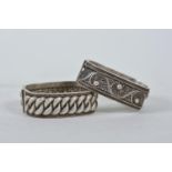 A Chinese white metal reticulated bangle with filigree style decoration, and another similar, 2½"