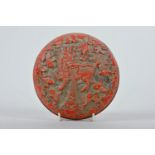 A Chinese cinnabar lacquer box, the cover carved with exotic beast and fish amongst water plants,