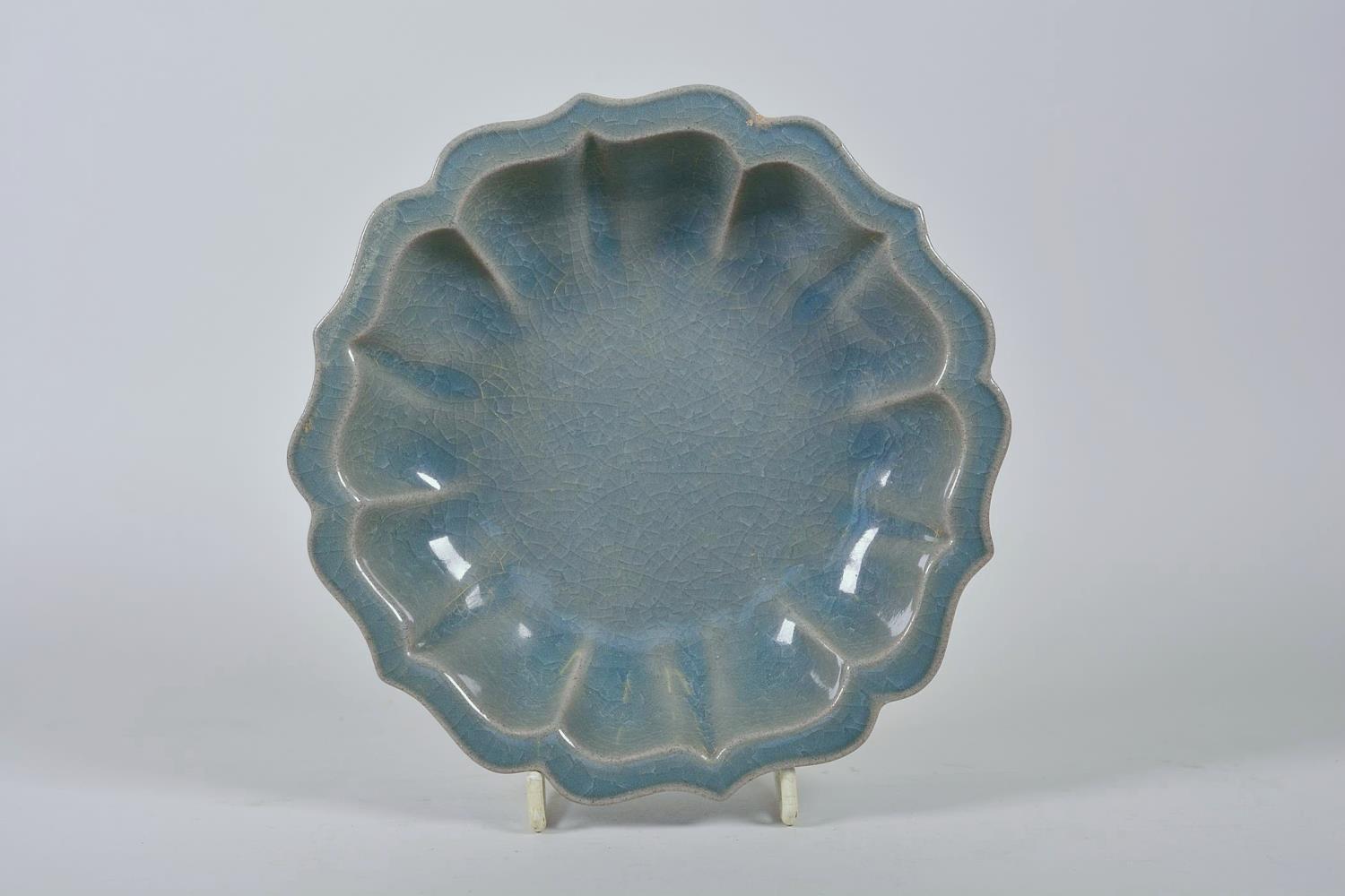 A Chinese celadon crackle glazed Ru ware style dish of lobed form, 7½" diameter