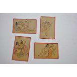 A set of four Indian miniature paintings on card depicting the kama sutra to one side and peacocks