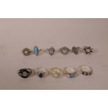 A collection of eleven silver dress rings
